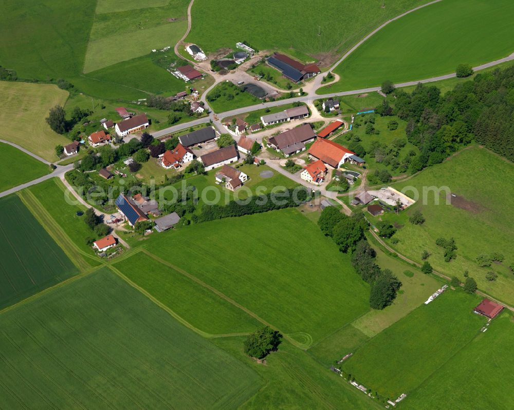 Aerial photograph Gutenzell-Hürbel - Agricultural land and field boundaries surround the settlement area of the village in Gutenzell-Hürbel in the state Baden-Wuerttemberg, Germany