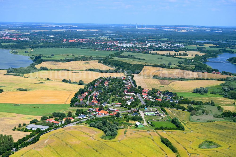 Aerial photograph Gutow - Agricultural land and field boundaries surround the settlement area of the village in Gutow in the state Mecklenburg - Western Pomerania, Germany