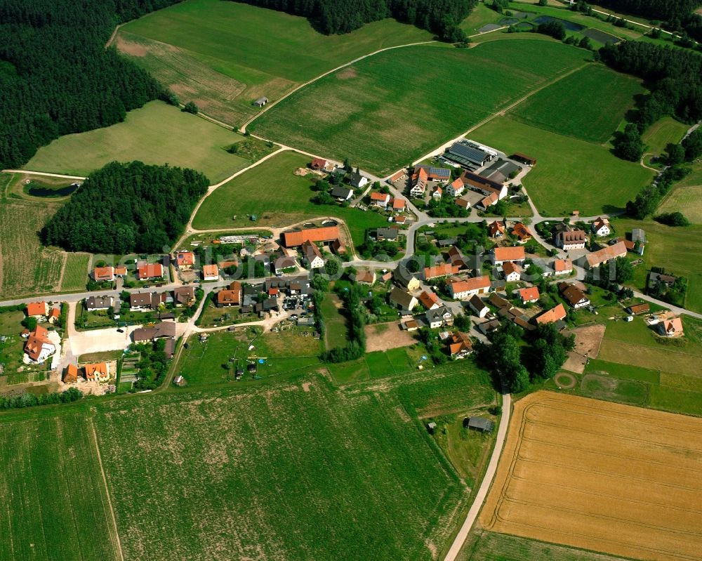 Haag from the bird's eye view: Agricultural land and field boundaries surround the settlement area of the village in Haag in the state Bavaria, Germany