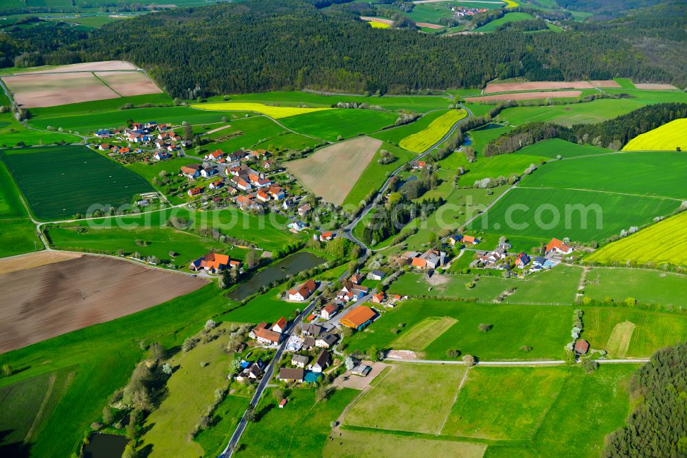 Haag from the bird's eye view: Agricultural land and field boundaries surround the settlement area of the village in Haag in the state Bavaria, Germany