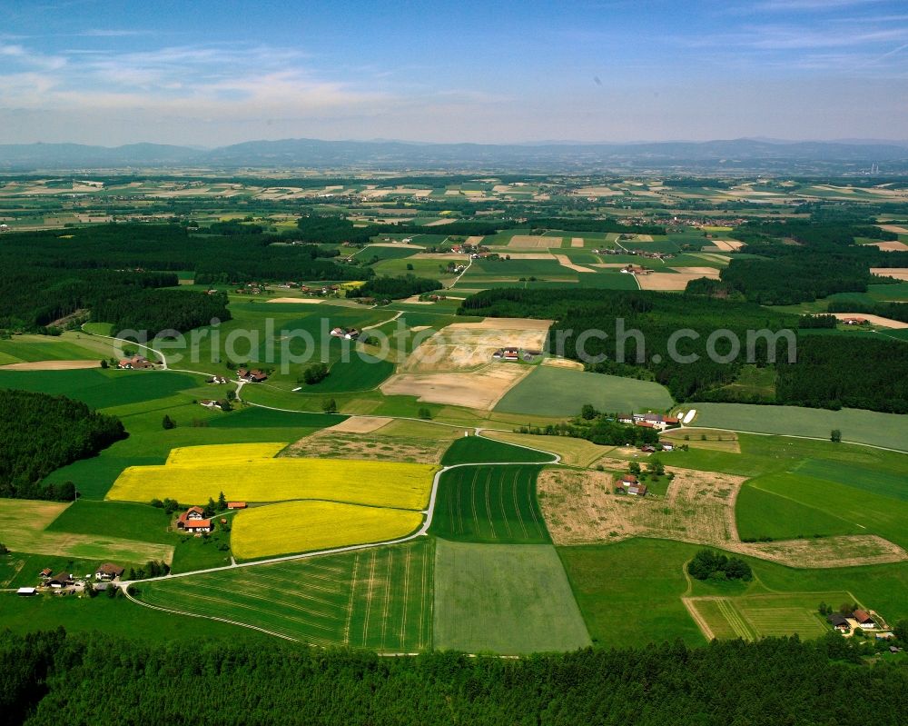 Aerial image Habach - Agricultural land and field boundaries surround the settlement area of the village in Habach in the state Bavaria, Germany