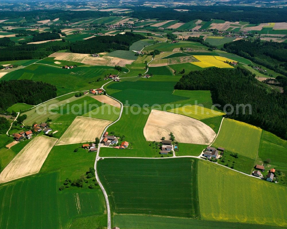 Aerial photograph Habach - Agricultural land and field boundaries surround the settlement area of the village in Habach in the state Bavaria, Germany