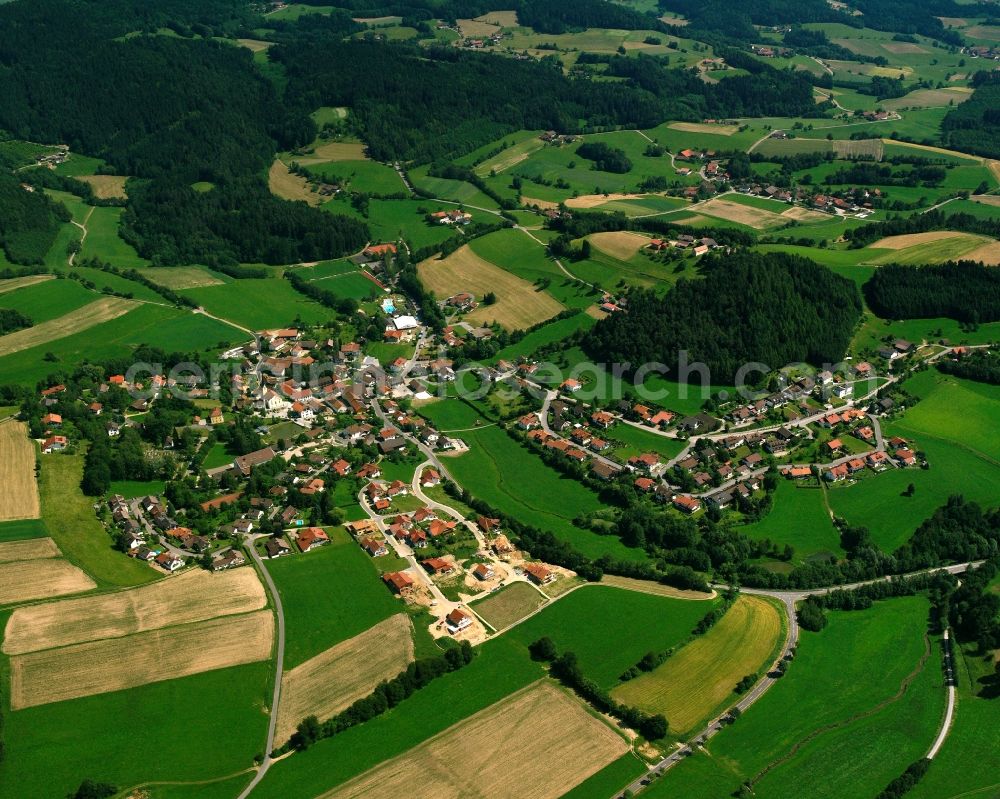 Haibach from the bird's eye view: Agricultural land and field boundaries surround the settlement area of the village in Haibach in the state Bavaria, Germany