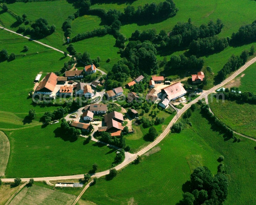 Haibach from the bird's eye view: Agricultural land and field boundaries surround the settlement area of the village in Haibach in the state Bavaria, Germany