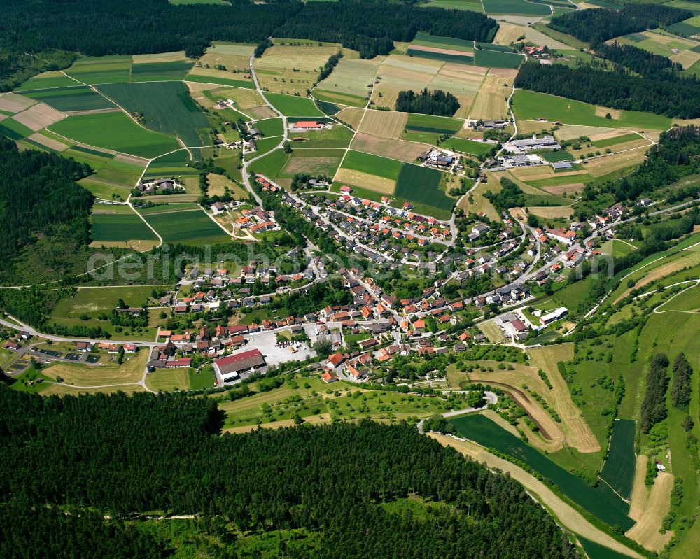 Aerial photograph Haiterbach - Agricultural land and field boundaries surround the settlement area of the village in Haiterbach in the state Baden-Wuerttemberg, Germany