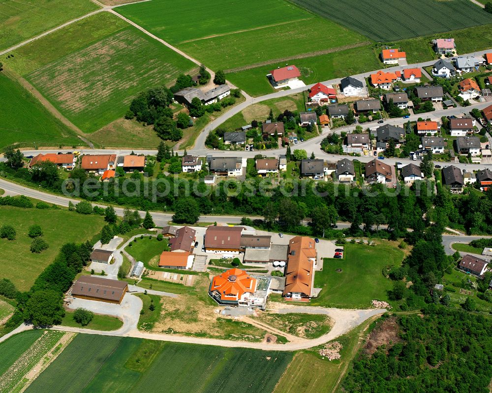 Aerial image Haiterbach - Agricultural land and field boundaries surround the settlement area of the village in Haiterbach in the state Baden-Wuerttemberg, Germany