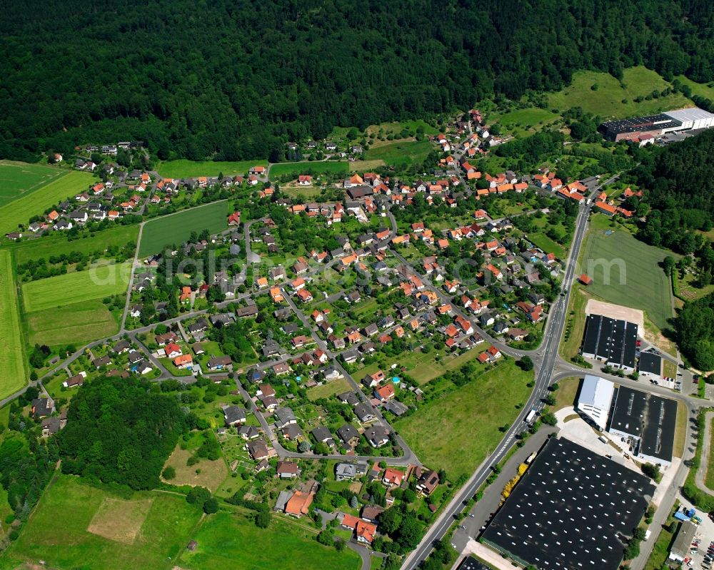 Hann. Münden from above - Agricultural land and field boundaries surround the settlement area of the village in Hann. Muenden in the state Lower Saxony, Germany