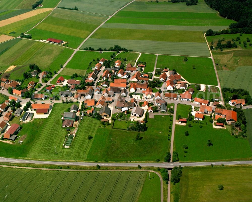 Harthausen from above - Agricultural land and field boundaries surround the settlement area of the village in Harthausen in the state Baden-Wuerttemberg, Germany