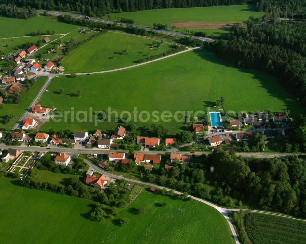 Aerial image Haundorf - Agricultural land and field boundaries surround the settlement area of the village in Haundorf in the state Bavaria, Germany