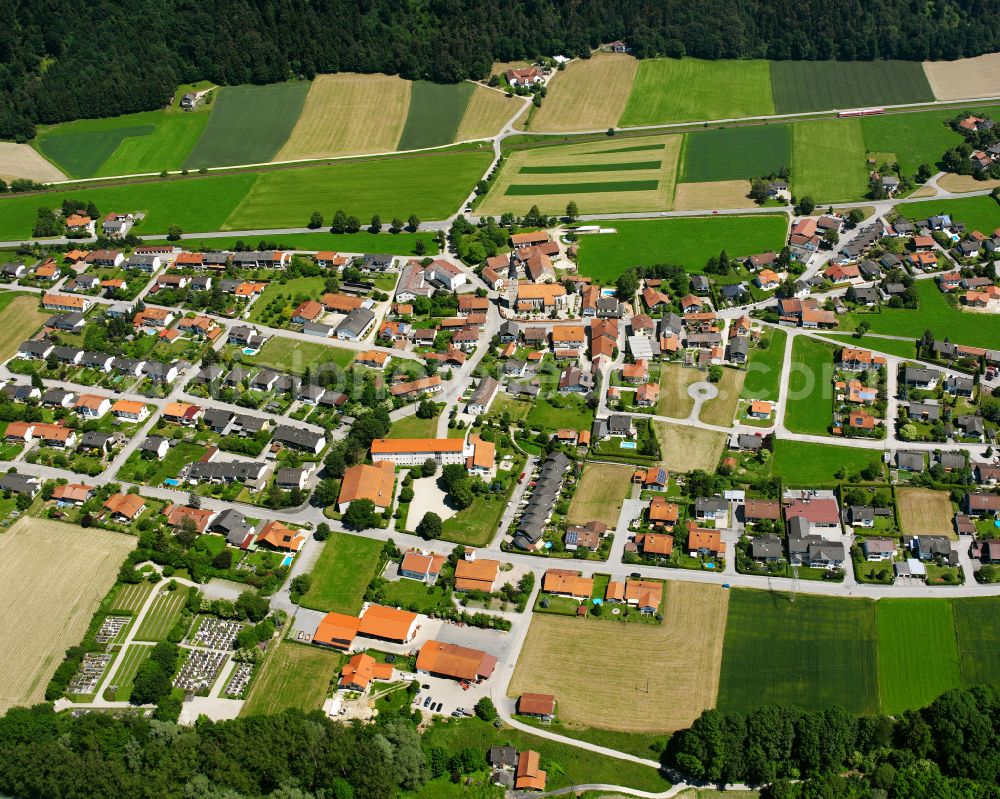 Aerial image Haunreit - Agricultural land and field boundaries surround the settlement area of the village in Haunreit in the state Bavaria, Germany