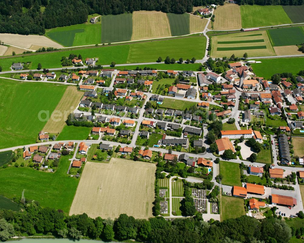 Aerial photograph Haunreit - Agricultural land and field boundaries surround the settlement area of the village in Haunreit in the state Bavaria, Germany