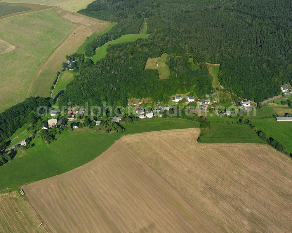 Aerial image Hausdorf - Agricultural land and field boundaries surround the settlement area of the village in Hausdorf in the state Saxony, Germany