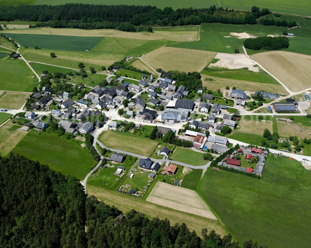 Hecken from the bird's eye view: Agricultural land and field boundaries surround the settlement area of the village in Hecken in the state Rhineland-Palatinate, Germany