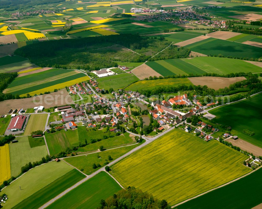 Aerial image Heiligkreuztal - Agricultural land and field boundaries surround the settlement area of the village in Heiligkreuztal in the state Baden-Wuerttemberg, Germany