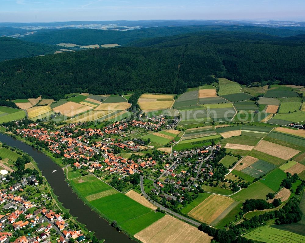 Aerial image Hemeln - Agricultural land and field boundaries surround the settlement area of the village in Hemeln in the state Lower Saxony, Germany