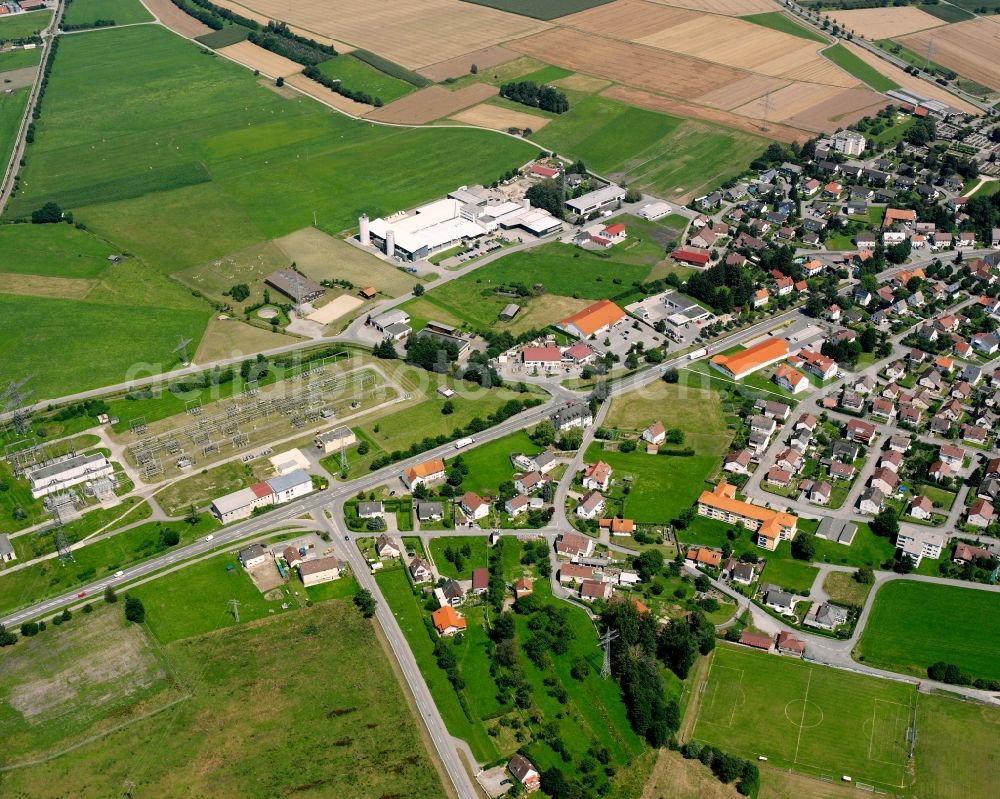 Herbertingen from above - Agricultural land and field boundaries surround the settlement area of the village in Herbertingen in the state Baden-Wuerttemberg, Germany