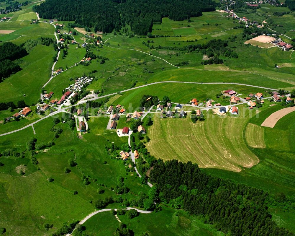 Aerial photograph Herrischried - Agricultural land and field boundaries surround the settlement area of the village in Herrischried in the state Baden-Wuerttemberg, Germany