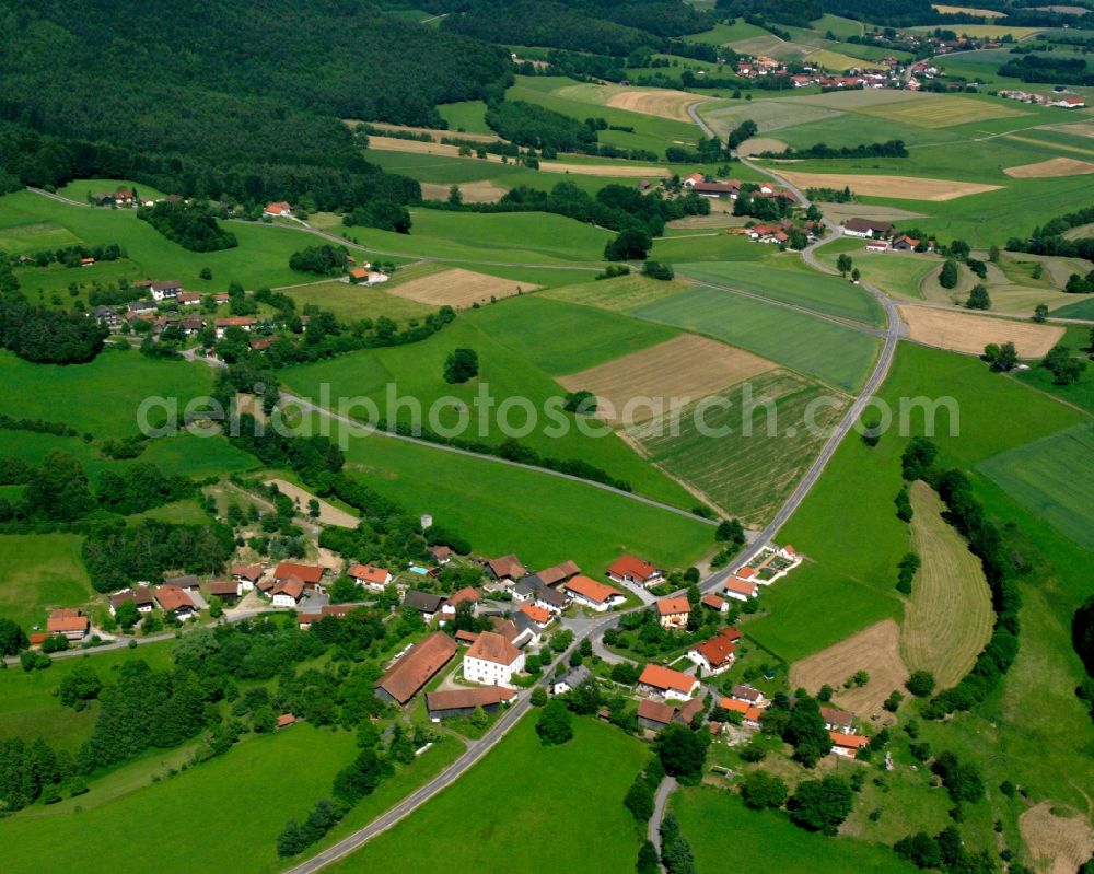 Aerial photograph Herrnfehlburg - Agricultural land and field boundaries surround the settlement area of the village in Herrnfehlburg in the state Bavaria, Germany