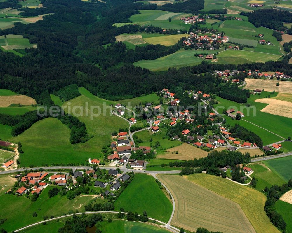 Aerial image Höfling - Agricultural land and field boundaries surround the settlement area of the village in Höfling in the state Bavaria, Germany