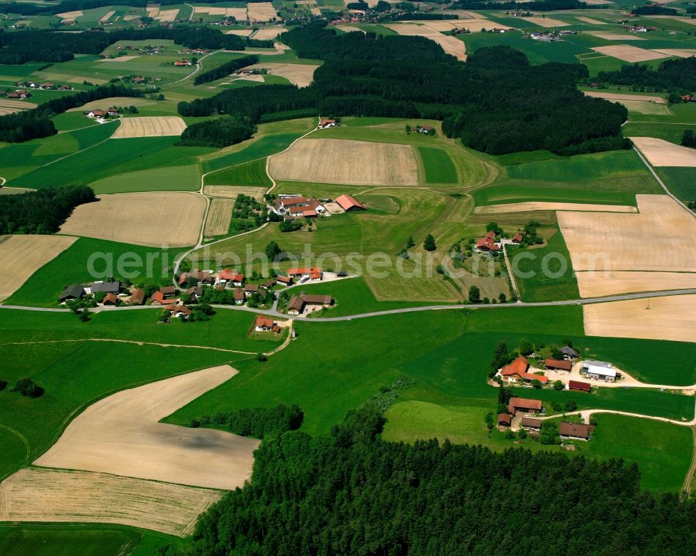 Aerial image Hiltraching - Agricultural land and field boundaries surround the settlement area of the village in Hiltraching in the state Bavaria, Germany