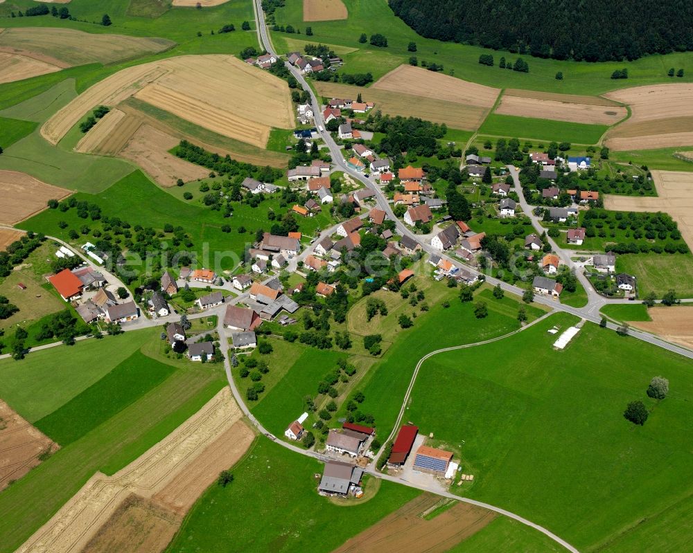 Hippetsweiler from above - Agricultural land and field boundaries surround the settlement area of the village in Hippetsweiler in the state Baden-Wuerttemberg, Germany