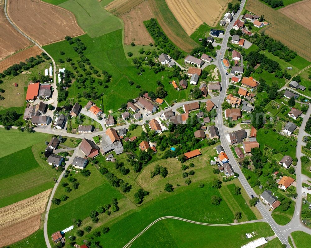 Aerial image Hippetsweiler - Agricultural land and field boundaries surround the settlement area of the village in Hippetsweiler in the state Baden-Wuerttemberg, Germany