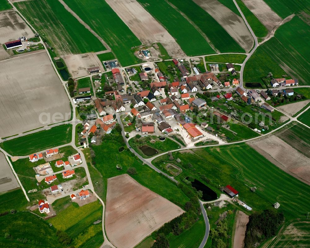 Aerial photograph Hirschbronn - Agricultural land and field boundaries surround the settlement area of the village in Hirschbronn in the state Bavaria, Germany