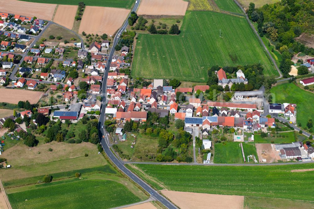 Aerial image Höllrich - Agricultural land and field boundaries surround the settlement area of the village in Höllrich in the state Bavaria, Germany