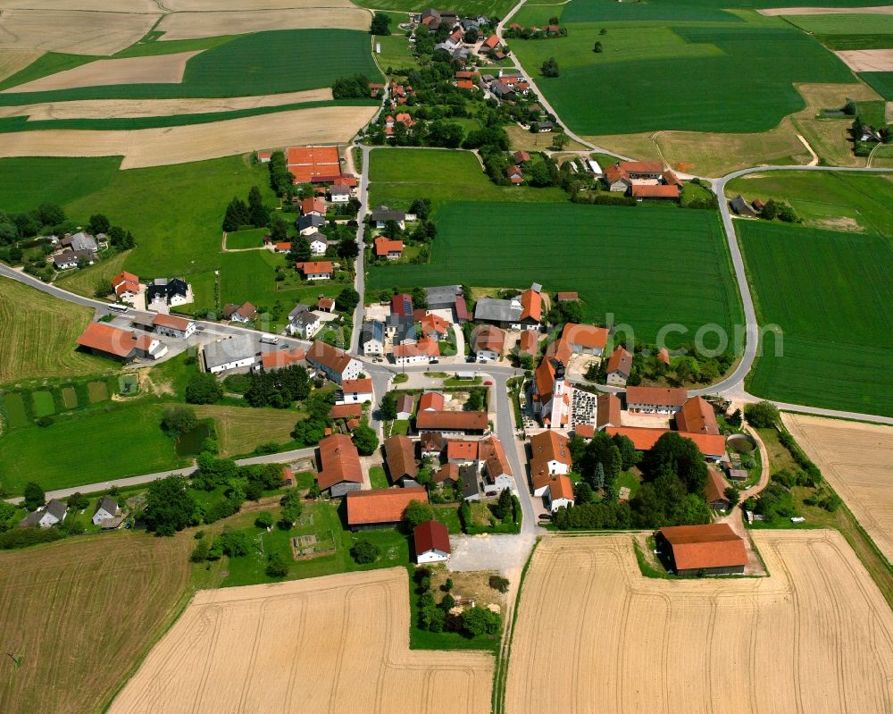 Hölsbrunn from the bird's eye view: Agricultural land and field boundaries surround the settlement area of the village in Hölsbrunn in the state Bavaria, Germany