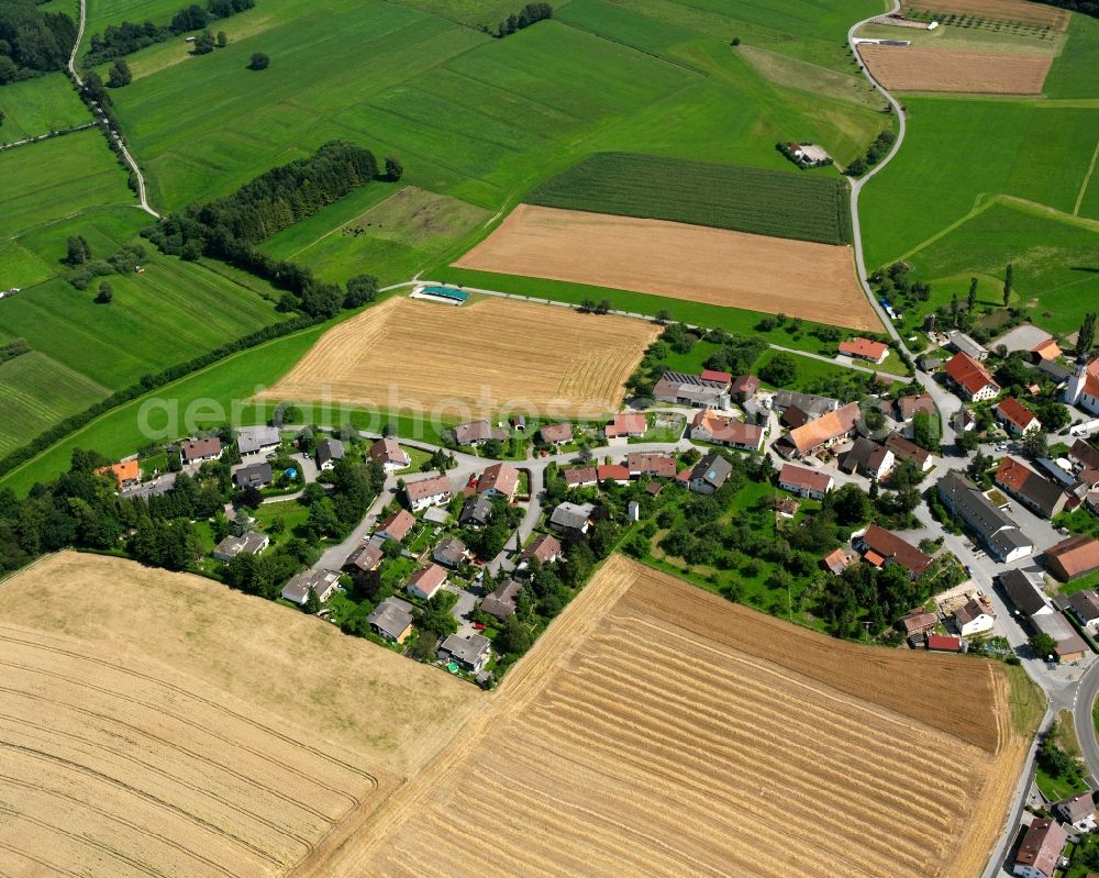 Hochberg from the bird's eye view: Agricultural land and field boundaries surround the settlement area of the village in Hochberg in the state Baden-Wuerttemberg, Germany