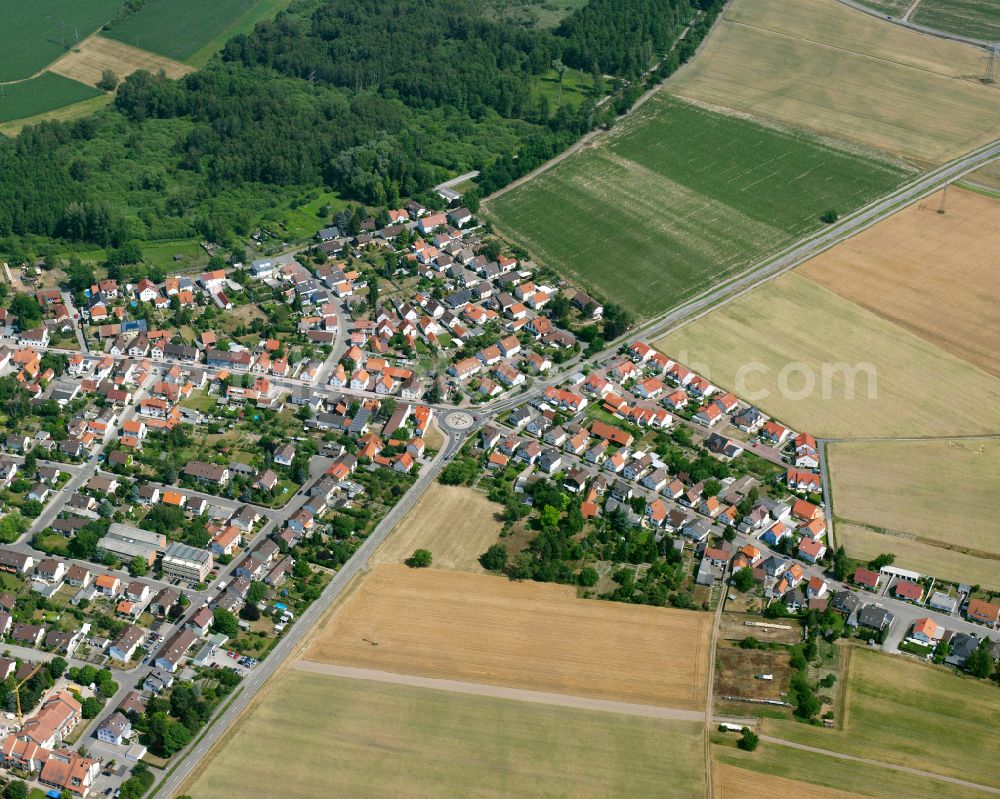 Aerial image Hochstetten - Agricultural land and field boundaries surround the settlement area of the village in Hochstetten in the state Baden-Wuerttemberg, Germany