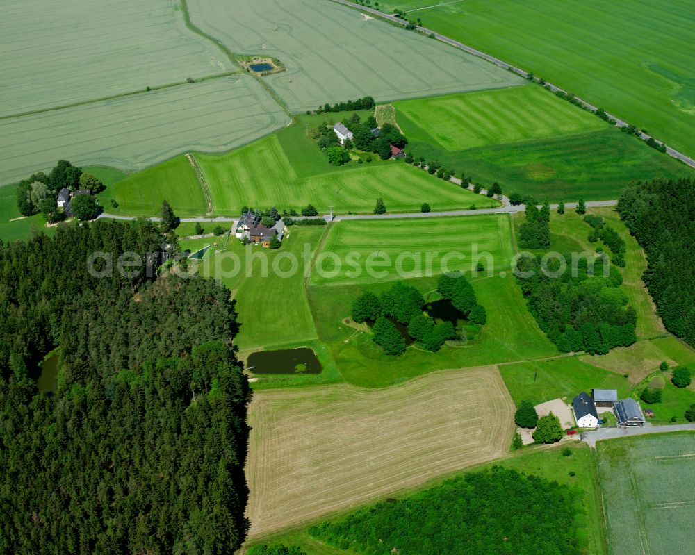 Aerial image Hohenbuch - Agricultural land and field boundaries surround the settlement area of the village in Hohenbuch in the state Bavaria, Germany