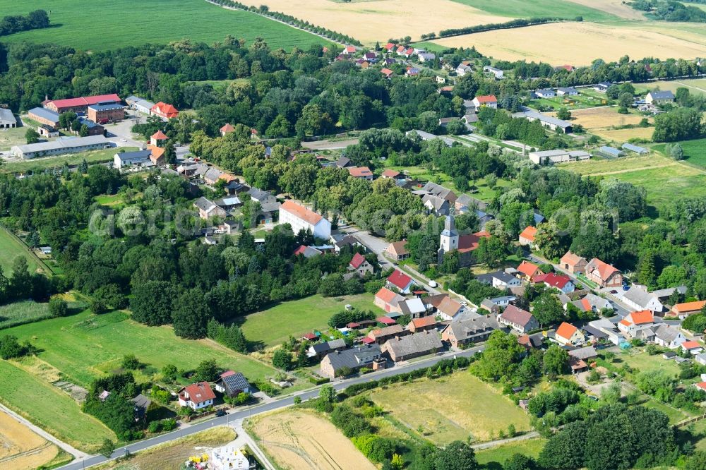 Aerial image Hohenfinow - Agricultural land and field boundaries surround the settlement area of the village in Hohenfinow in the state Brandenburg, Germany