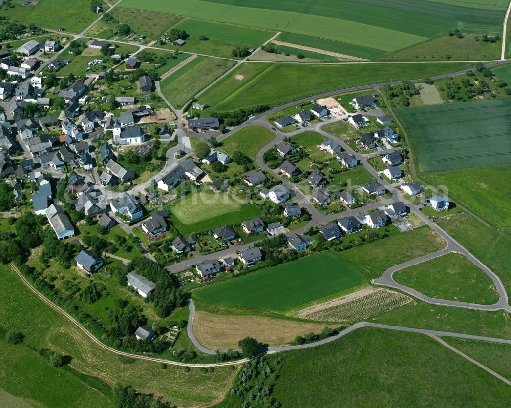 Horn from above - Agricultural land and field boundaries surround the settlement area of the village in Horn in the state Rhineland-Palatinate, Germany