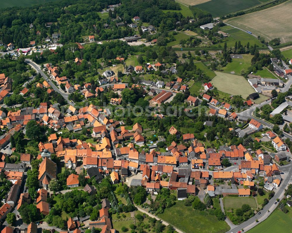 Aerial photograph Hornburg - Agricultural land and field boundaries surround the settlement area of the village in Hornburg in the state Lower Saxony, Germany