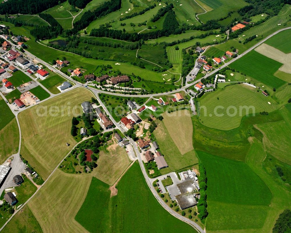 Hottingen from the bird's eye view: Agricultural land and field boundaries surround the settlement area of the village in Hottingen in the state Baden-Wuerttemberg, Germany