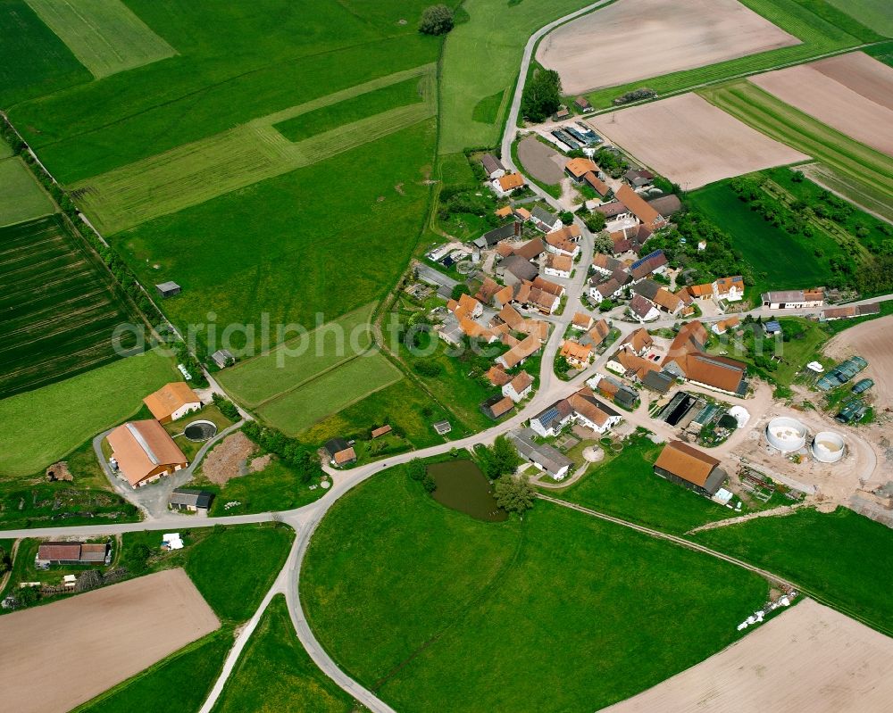 Aerial image Hürbel - Agricultural land and field boundaries surround the settlement area of the village in Hürbel in the state Bavaria, Germany