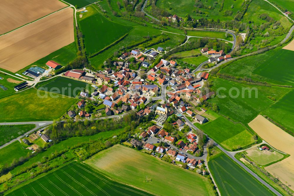 Aerial photograph Iffigheim - Agricultural land and field boundaries surround the settlement area of the village in Iffigheim in the state Bavaria, Germany