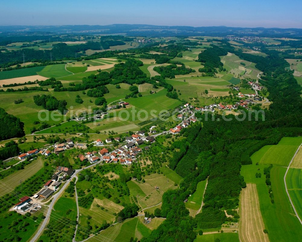 Indlekofen from the bird's eye view: Agricultural land and field boundaries surround the settlement area of the village in Indlekofen in the state Baden-Wuerttemberg, Germany