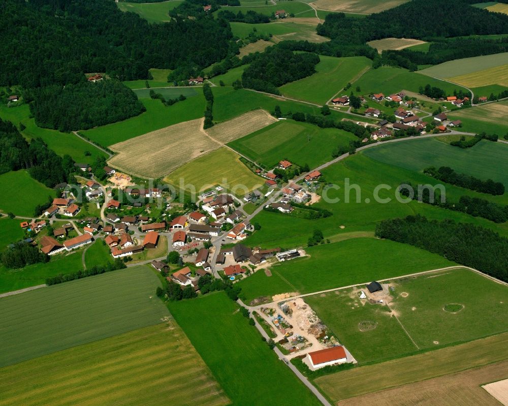 Aerial image Irschenbach - Agricultural land and field boundaries surround the settlement area of the village in Irschenbach in the state Bavaria, Germany