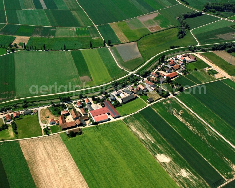 Aerial image Ittling - Agricultural land and field boundaries surround the settlement area of the village in Ittling in the state Bavaria, Germany