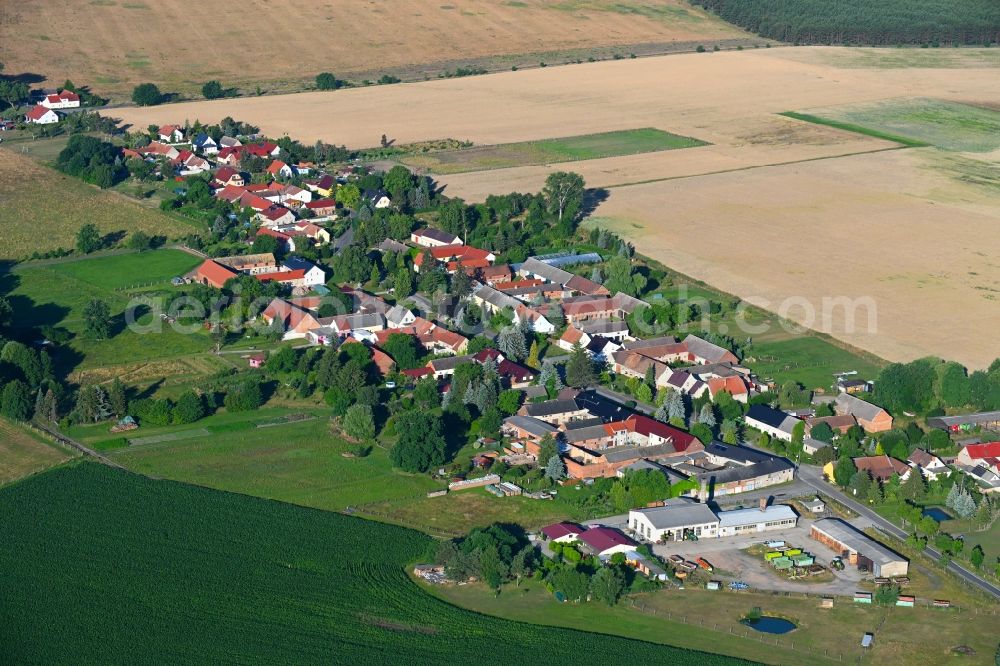 Jagsal from above - Agricultural land and field boundaries surround the settlement area of the village in Jagsal in the state Brandenburg, Germany