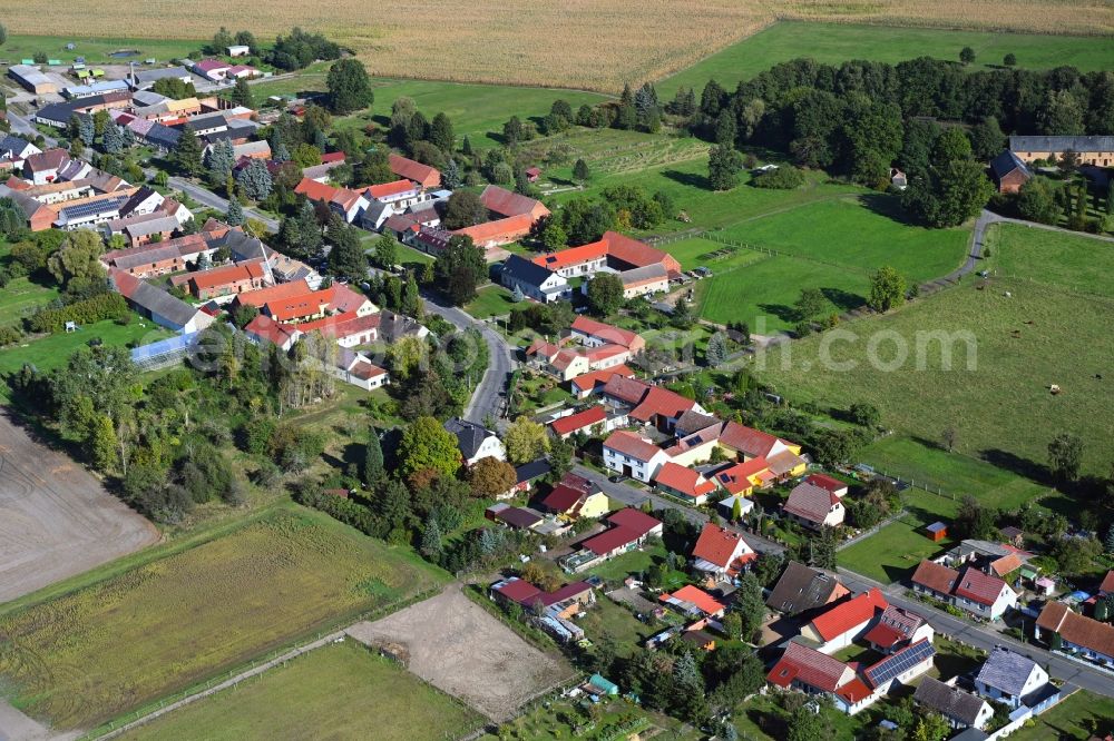 Aerial photograph Jagsal - Agricultural land and field boundaries surround the settlement area of the village in Jagsal in the state Brandenburg, Germany