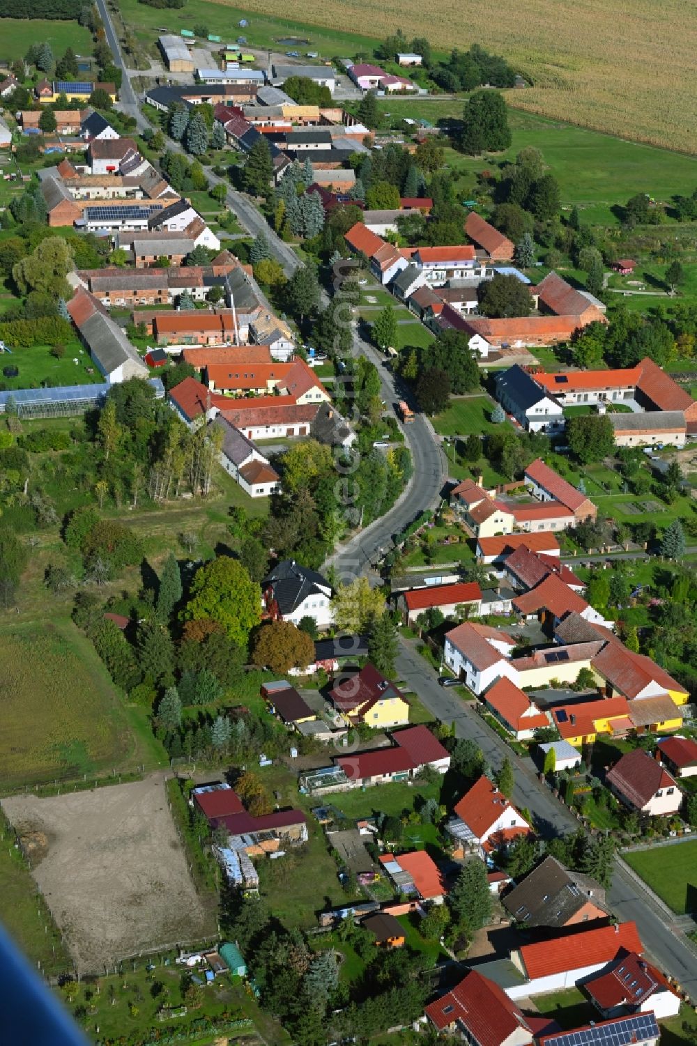 Jagsal from above - Agricultural land and field boundaries surround the settlement area of the village in Jagsal in the state Brandenburg, Germany