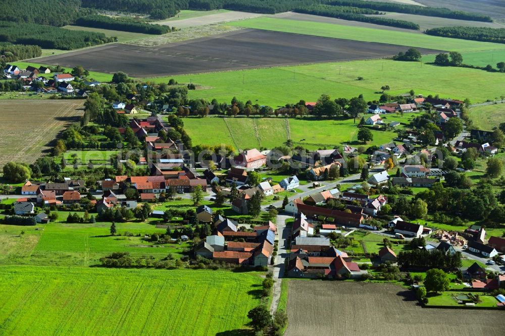 Aerial image Jerchel - Agricultural land and field boundaries surround the settlement area of the village in Jerchel in the state Saxony-Anhalt, Germany