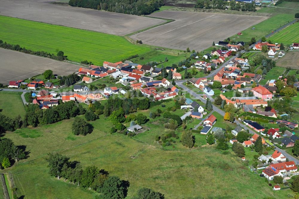 Aerial image Jerchel - Agricultural land and field boundaries surround the settlement area of the village in Jerchel in the state Saxony-Anhalt, Germany