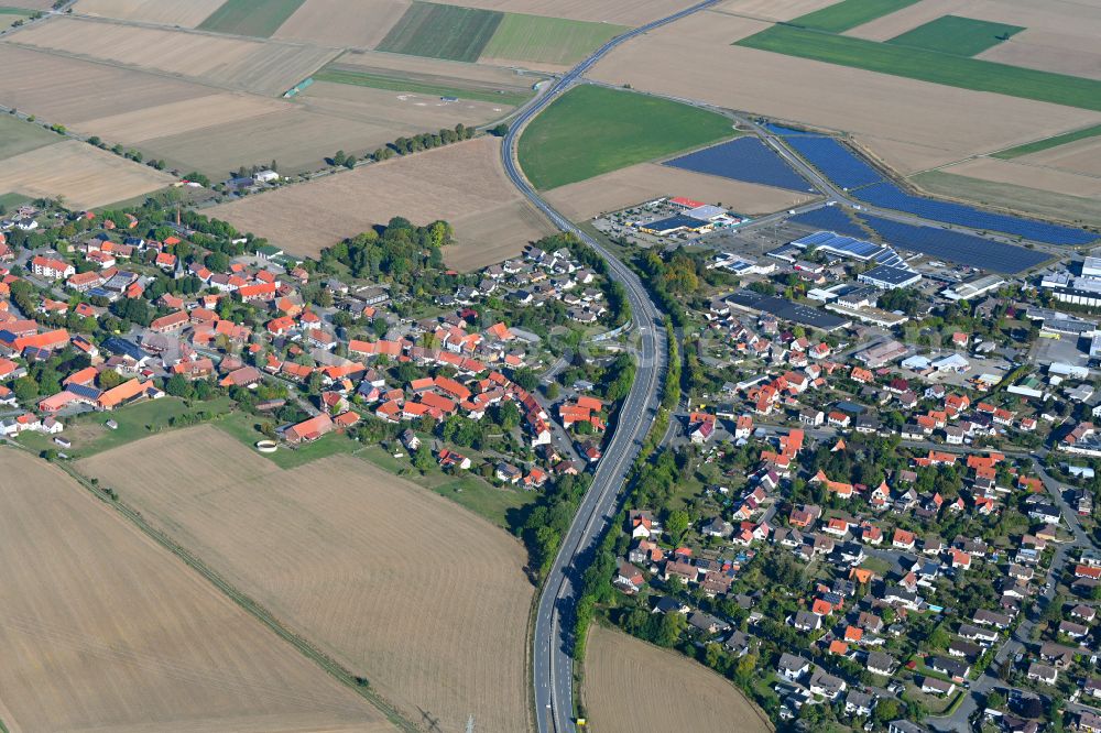 Aerial image Jerstedt - Agricultural land and field boundaries surround the settlement area of the village in Jerstedt in the state Lower Saxony, Germany