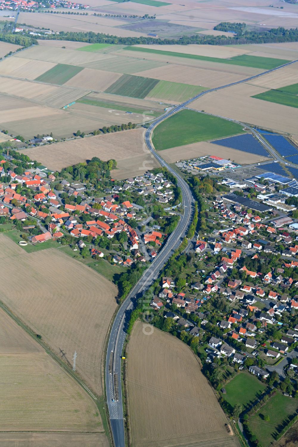 Aerial photograph Jerstedt - Agricultural land and field boundaries surround the settlement area of the village in Jerstedt in the state Lower Saxony, Germany