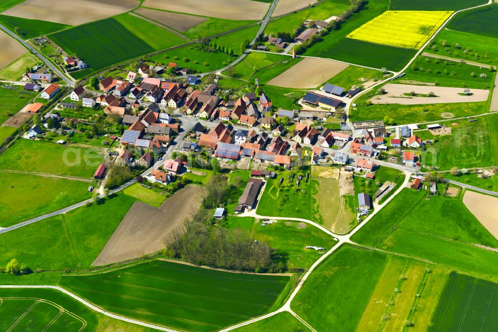 Aerial image Järkendorf - Agricultural land and field boundaries surround the settlement area of the village in Järkendorf in the state Bavaria, Germany