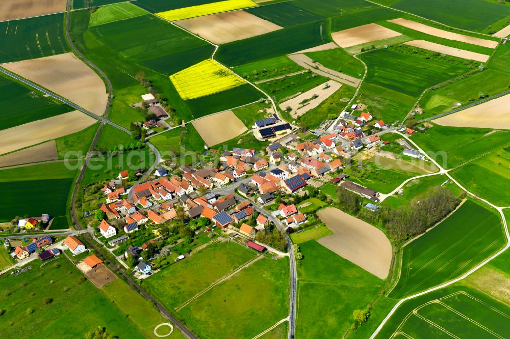 Aerial photograph Järkendorf - Agricultural land and field boundaries surround the settlement area of the village in Järkendorf in the state Bavaria, Germany